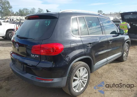 2014 Volkswagen Tiguan Sel z USA, uszkodzony, nr VIN WVGAV3AX4EW578234